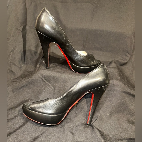 ⭐️FALL SALE⭐️ Prada Black Leather Heels. Red soles. Sz 40.5. With a 5 inch heel. - Picture 1 of 8